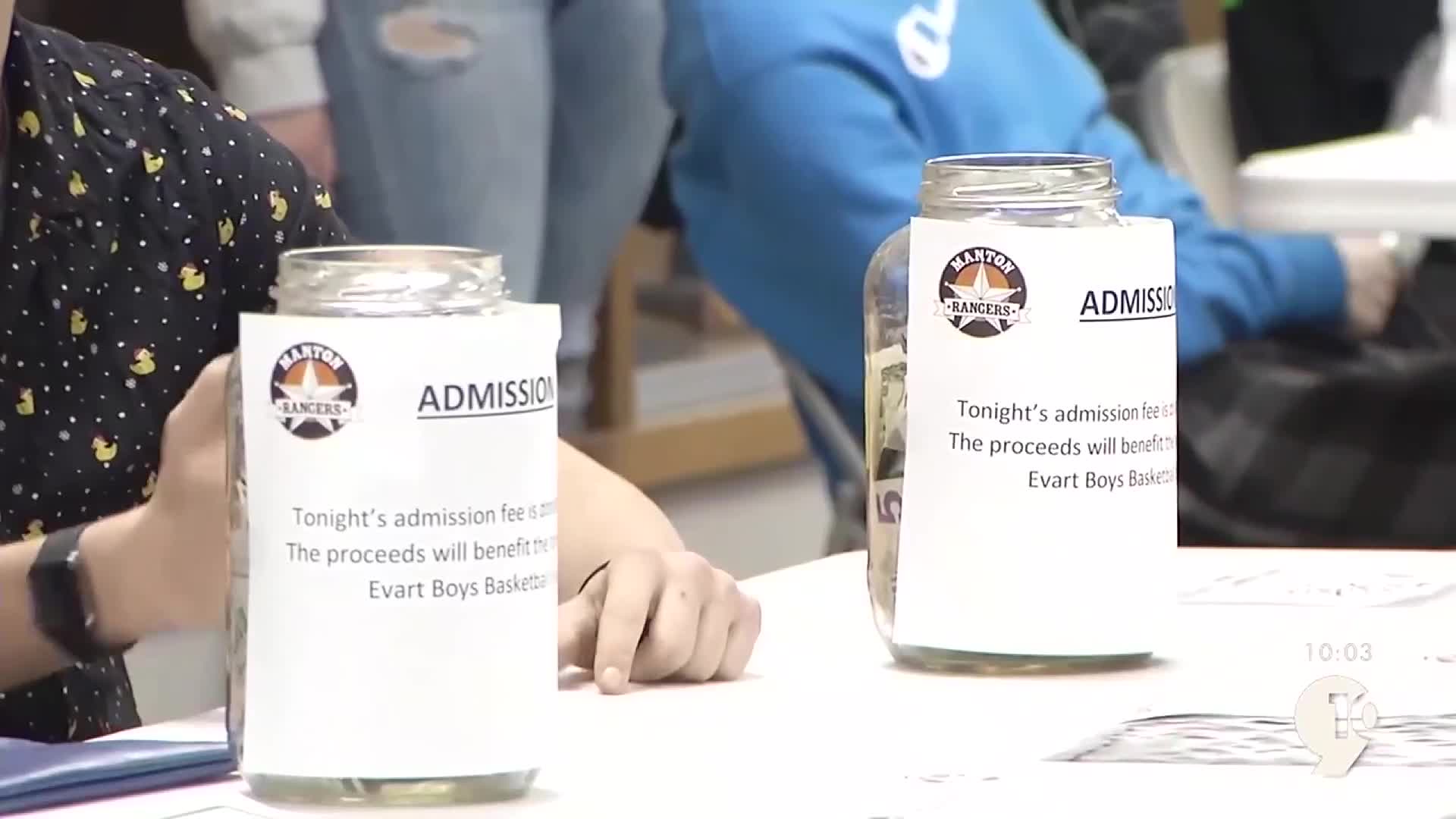 Two local high schools collect donations to benefit families, players
